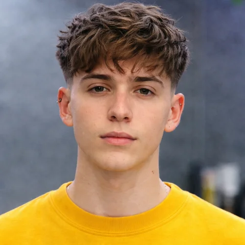 modern men’s haircut with clean fade and textured top