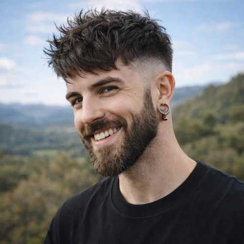 men’s haircut with long top and low taper fade sides