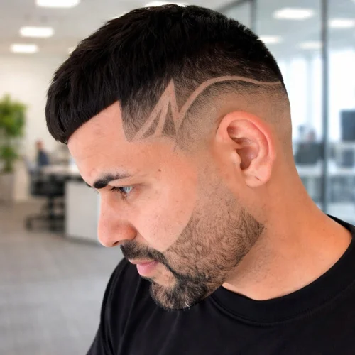 french crop haircut with skin fade and sharp hair design line modern mens hairstyle in barbershop